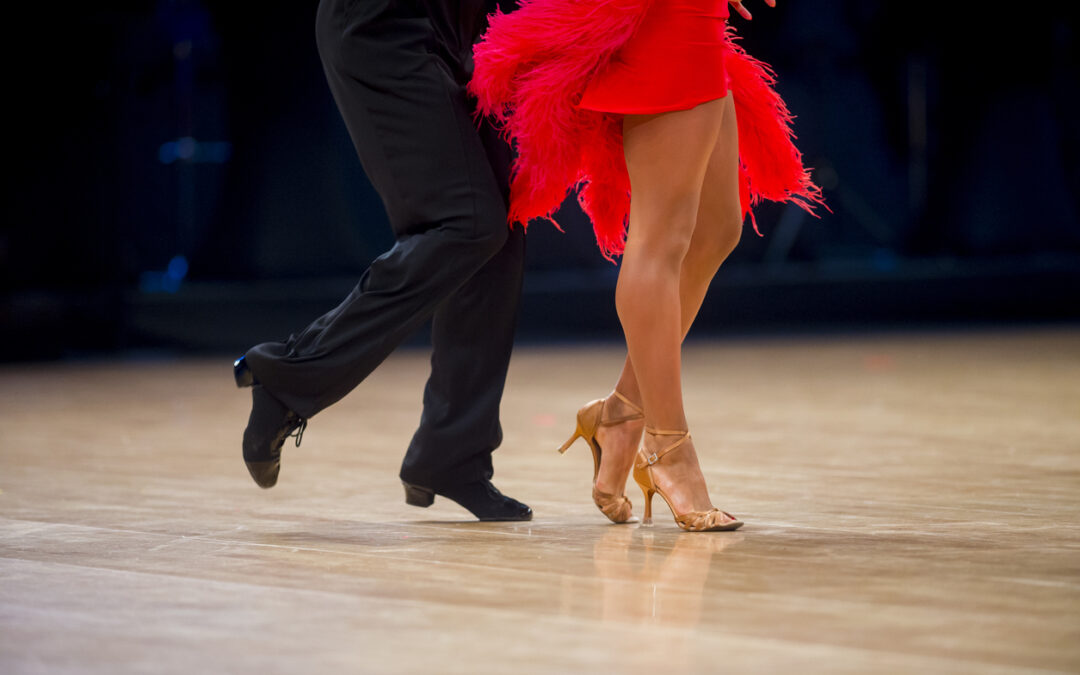 Latin Night in Long Island - A couple dancing Salsa on the dance floor.